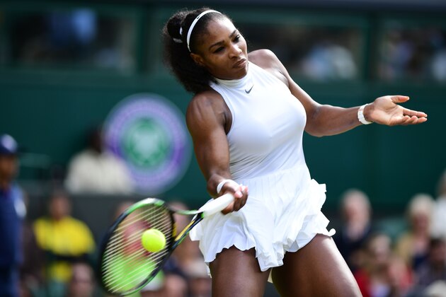 US player Serena Williams returns against Russia's Anastasia Pavlyuchenkova during their women's singles quarter-final match on the ninth day of the 2016 Wimbledon Championships at The All England Lawn Tennis Club in Wimbledon, southwest London, on July 5, 2016. / AFP / GLYN KIRK / RESTRICTED TO EDITORIAL USE        (Photo credit should read GLYN KIRK/AFP/Getty Images)