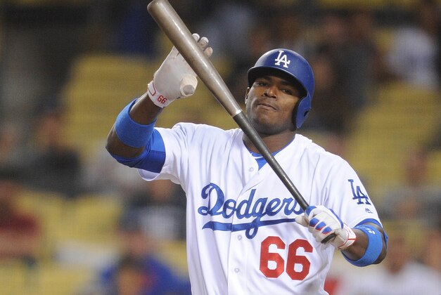 July 5, 2016; Los Angeles, CA, USA; Los Angeles Dodgers  right fielder Yasiel Puig (66) reacts after striking out in the ninth inning against Baltimore Orioles at Dodger Stadium. Mandatory Credit: Gary A. Vasquez-USA TODAY Sports