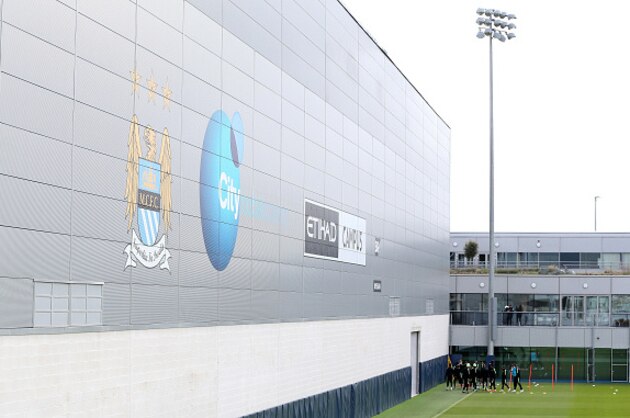 MANCHESTER, ENGLAND - MAY 03:  The Manchester City squad warm up during a training session ahead of the UEFA Champions League Semi Final Second Leg match between Real Madrid and Manchester City at the Academy Training Ground on May 3, 2016 in Manchester, England.  (Photo by Jan Kruger/Getty Images)