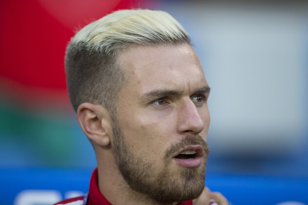 LYON, FRANCE - JULY 06:  Wales's Aaron Ramsey on the sidelines before kick off during the UEFA Euro 2016 Semi-final match between Portugal and Wales at Stade de Lyon on July 06 in Lyon, France.  (Photo by Craig Mercer/CameraSport via Getty Images)