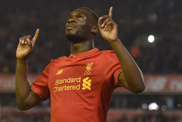 Liverpool's Christian Benteke celebrates after scoring his team's first goal during the English Premier League football match between Liverpool and Chelsea at Anfield in Liverpool, north west England on May 11, 2016. / AFP / PAUL ELLIS / RESTRICTED TO EDITORIAL USE. No use with unauthorized audio, video, data, fixture lists, club/league logos or 'live' services. Online in-match use limited to 75 images, no video emulation. No use in betting, games or single club/league/player publications.  /         (Photo credit should read PAUL ELLIS/AFP/Getty Images)