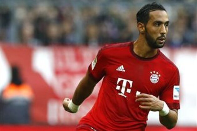 Bayern's Medhi Benatia controls the ball during the German Bundesliga soccer match between FC Bayern Munich and FC Schalke 04 at the Allianz Arena stadium in Munich, Germany, Saturday, April 16, 2016. (AP Photo/Matthias Schrader)