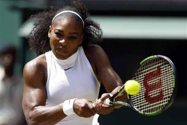 Serena Williams of the U.S returns to Elena Vesnina of Russia during their women's singles match on day eleven of the Wimbledon Tennis Championships in London, Thursday, July 7, 2016. (AP Photo/Kirsty Wigglesworth)