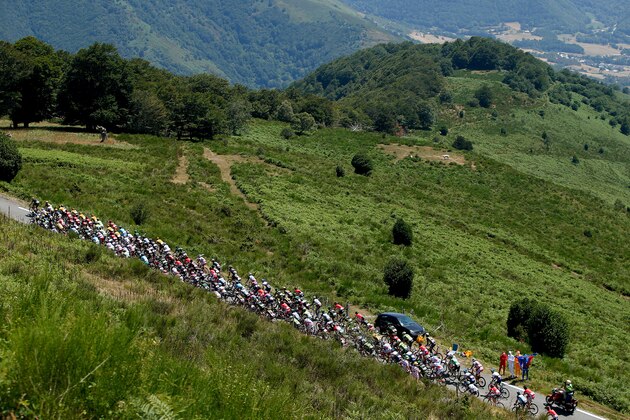 CAUTERETS, FRANCE - JULY 15:  The peloton makes its way up the Col d'Aspin during stage eleven of the 2015 Tour de France, a 188 km stage between Pau and Cauterets, on July 15, 2015 in Cauterets, France.  (Photo by Doug Pensinger/Getty Images)