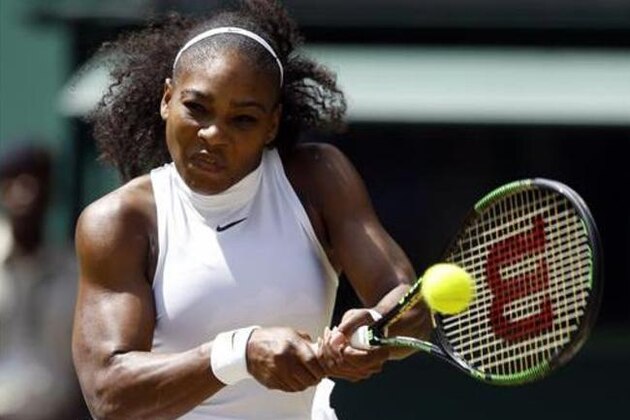 Serena Williams of the U.S returns to Elena Vesnina of Russia during their women's singles match on day eleven of the Wimbledon Tennis Championships in London, Thursday, July 7, 2016. (AP Photo/Kirsty Wigglesworth)