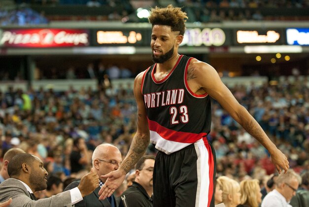 Apr 5, 2016; Sacramento, CA, USA; Portland Trail Blazers guard Allen Crabbe (23) high fives team mates after scoring against the Sacramento Kings during the second quarter at Sleep Train Arena. The Portland Trail Blazers defeated the Sacramento Kings 115-107. Mandatory Credit: Ed Szczepanski-USA TODAY Sports