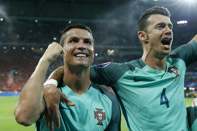 (L-R) Cristiano Ronaldo of Portugal, Jose Fonte  of Portugal during the UEFA EURO semi-final match between Portugal and Wales on July 6, 2016 at the Stade de Lyon in Lyon, France.(Photo by VI Images via Getty Images)