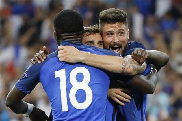 France's Antoine Griezmann, center, celebrates with his teammate Olivier Giroud, right, and Moussa Sissoko after scoring his side's second goal during the Euro 2016 semifinal soccer match between Germany and France, at the Velodrome stadium in Marseille, France, Thursday, July 7, 2016. (AP Photo/Frank Augstein)