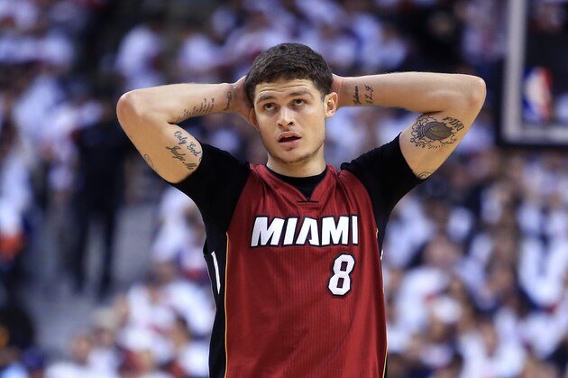 TORONTO, ON - MAY 15:  Tyler Johnson #8 of the Miami Heat looks on in the second half of Game Seven of the Eastern Conference Quarterfinals against the Toronto Raptors during the 2016 NBA Playoffs at the Air Canada Centre on May 15, 2016 in Toronto, Ontario, Canada.  NOTE TO USER: User expressly acknowledges and agrees that, by downloading and or using this photograph, User is consenting to the terms and conditions of the Getty Images License Agreement.  (Photo by Vaughn Ridley/Getty Images)