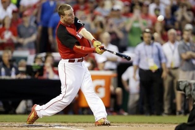 National League’s Todd Frazier, of the  Cincinnati Reds, hits during the MLB All-Star baseball Home Run Derby, Monday, July 13, 2015, in Cincinnati. (AP Photo/Jeff Roberson)