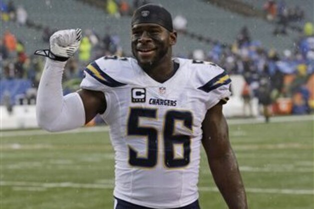 San Diego Chargers linebacker Donald Butler (56) celebrates after a 27-10 win over the Cincinnati Bengals in an NFL wild-card playoff football game Sunday, Jan. 5, 2014, in Cincinnati. (AP Photo/Al Behrman)