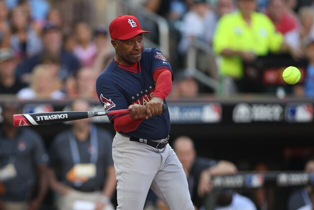 Jul 13, 2014; Minneapolis, MN, USA; St. Louis Cardinals former player Ozzie Smith at bat during the MLB legends and celebrity softball game at Target Field. Mandatory Credit: Jerry Lai-USA TODAY Sports