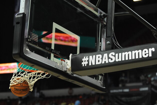 Jul 20, 2015; Las Vegas, NV, USA; A ball drops through a hoop as the Phoenix Suns and San Antonio Spurs warm up for the NBA Summer League Final at Thomas & Mack Center. Mandatory Credit: Stephen R. Sylvanie-USA TODAY Sports