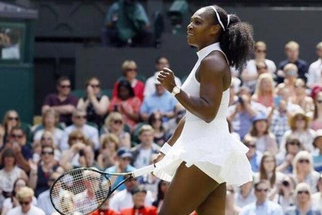 Serena Williams of the U.S celebrates after beating Elena Vesnina of Russia in their women's singles match on day eleven of the Wimbledon Tennis Championships in London, Thursday, July 7, 2016. (AP Photo/Kirsty Wigglesworth)