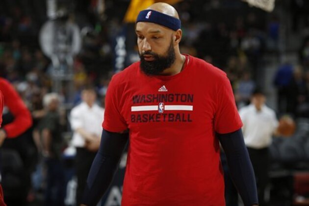 Washington Wizards forward Drew Gooden (90) in the first half of an NBA basketball game Saturday, March 12, 2016, in Denver. (AP Photo/David Zalubowski)