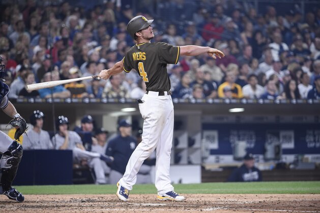 SAN DIEGO, CALIFORNIA - JULY 1:  Wil Myers #4 of the San Diego Padres hits a two-run home run during the fifth inning of a baseball game against the New York Yankees at PETCO Park on July 1, 2016 in San Diego, California.  (Photo by Denis Poroy/Getty Images)