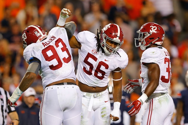 AUBURN, AL - NOVEMBER 28:  Jonathan Allen #93, Tim Williams #56 and Rashaan Evans #32 of the Alabama Crimson Tide react after a defensive stop against the Auburn Tigers at Jordan Hare Stadium on November 28, 2015 in Auburn, Alabama.  (Photo by Kevin C. Cox/Getty Images)