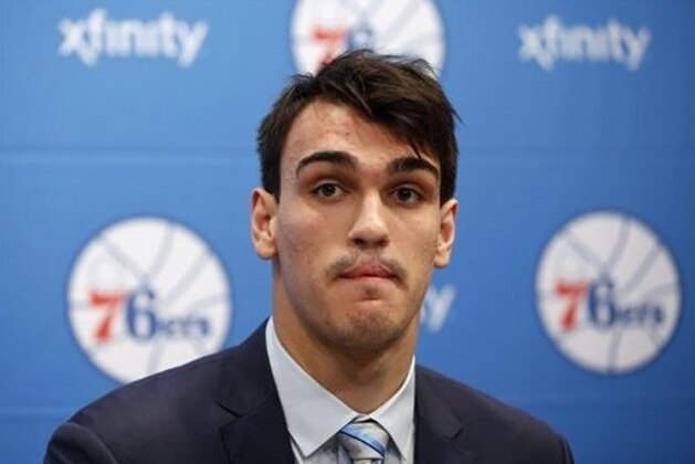 Newly-drafted Philadelphia 76ers' Dario Saric listens to a question during a basketball news conference at the team's practice facility, Saturday, June 28, 2014, in Philadelphia. (AP Photo/Matt Slocum)