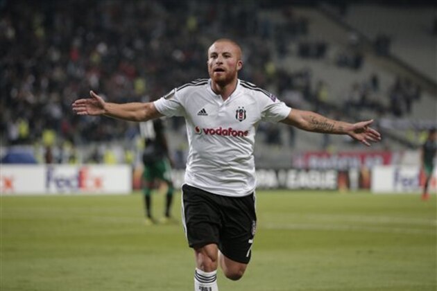 Besiktas Gokhan Tore celebrates after scoring against Sporting Portugal during their Europa League Group H soccer match at the Ataturk Olimpiyat Stadium in Istanbul, Thursday, Oct. 1, 2015. (AP Photo/Lefteris Pitarakis)