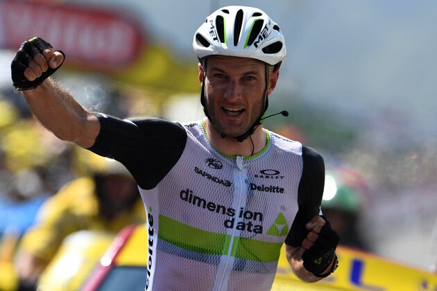 Great Britain's Stephen Cummings celebrates as he crosses the finish line at the end of the 162,5 km seventh stage of the 103rd edition of the Tour de France cycling race on July 8, 2016 between L'Isle-Jourdain and Lac de Payolle.
 / AFP / LIONEL BONAVENTURE        (Photo credit should read LIONEL BONAVENTURE/AFP/Getty Images)