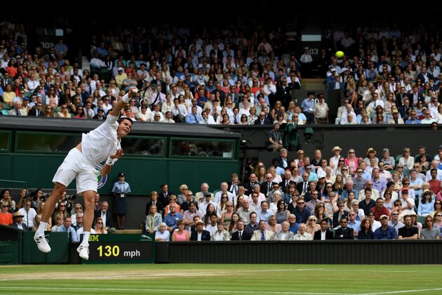 LONDON, ENGLAND - JULY 08:  Milos Raonic of Canada serves during the Men's Singles Semi Final match against Roger Federer of Switzerland on day eleven of the Wimbledon Lawn Tennis Championships at the All England Lawn Tennis and Croquet Club on July 8, 2016 in London, England.  (Photo by Shaun Botterill/Getty Images)