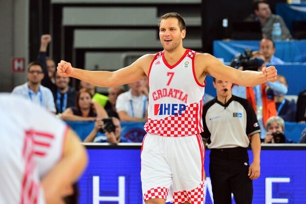Bojan Bogdanovic (R) of Croatia celebrates after winning the FIBA European basketball championships quarterfinal match between Croatia and Ukraine in Ljubljana, on September 19, 2013.  AFP PHOTO / JURE MAKOVEC        (Photo credit should read Jure Makovec/AFP/Getty Images)