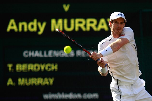 LONDON, ENGLAND - JULY 08:  Andy Murray of Great Britain plays a backhand during the Men's Singles Semi Final match against Tomas Berdych of The Czech Republic on day eleven of the Wimbledon Lawn Tennis Championships at the All England Lawn Tennis and Croquet Club on July 8, 2016 in London, England.  (Photo by Adam Pretty/Getty Images)
