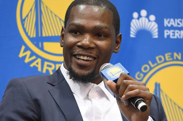 OAKLAND, CA - JULY 07:  Kevin Durant speaks to the media during the press conference where he was introduced as a member of the Golden State Warriors after they signed him as a free agent on July 7, 2016 in Oakland, California.  (Photo by Thearon W. Henderson/Getty Images)
