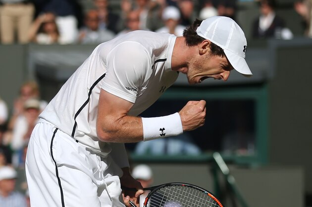 Britain's Andy Murray celebrates winning a point against Czech Republic's Tomas Berdych during their men's singles semi-final match on the twelfth day of the 2016 Wimbledon Championships at The All England Lawn Tennis Club in Wimbledon, southwest London, on July 8, 2016. / AFP / AFP AND POOL / JUSTIN TALLIS / RESTRICTED TO EDITORIAL USE        (Photo credit should read JUSTIN TALLIS/AFP/Getty Images)