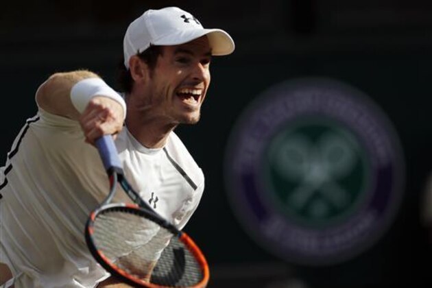 Andy Murray of Britain returns to Tomas Berdych of the Czech Republic during their men's semifinal singles match on day twelve of the Wimbledon Tennis Championships in London, Friday, July 8, 2016. (AP Photo/Ben Curtis)