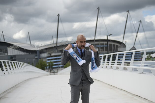 Manchester City's Spanish football coach Pep Guardiola poses for pictures outside the Etihad Stadium in Manchester, northern England, on July 8, 2016.

Pep Guardiola has warned his Manchester City players that they have to prove themselves all over again following his arrival at the club. / AFP / OLI SCARFF / RESTRICTED TO EDITORIAL USE. NO USE WITH UNAUTHORIZED AUDIO, VIDEO, DATA, FIXTURE LISTS, CLUB/LEAGUE LOGOS OR 'LIVE' SERVICES. ONLINE IN-MATCH USE LIMITED TO 45 IMAGES, NO VIDEO EMULATION. NO USE IN BETTING, GAMES OR SINGLE CLUB/LEAGUE/PLAYER PUBLICATIONS.        (Photo credit should read OLI SCARFF/AFP/Getty Images)