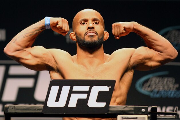 Apr 24, 2015; Montreal, Quebec, CAN; Demetrious Johnson stands on the scale during weigh-ins for UFC 186 at Metropolis. Mandatory Credit: Jean-Yves Ahern-USA TODAY Sports