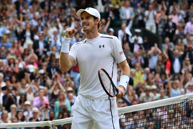 Britain's Andy Murray celebrates beating Czech Republic's Tomas Berdych in their men's singles semi-final match on the twelfth day of the 2016 Wimbledon Championships at The All England Lawn Tennis Club in Wimbledon, southwest London, on July 8, 2016. / AFP / LEON NEAL / RESTRICTED TO EDITORIAL USE        (Photo credit should read LEON NEAL/AFP/Getty Images)