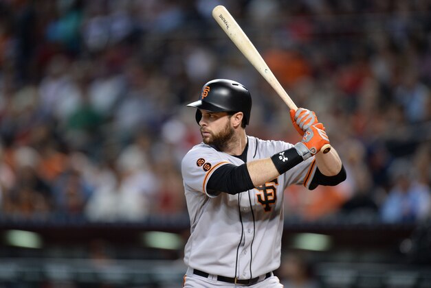 Jul 3, 2016; Phoenix, AZ, USA; San Francisco Giants first baseman Brandon Belt (9) bats in the seventh inning against the Arizona Diamondbacks at Chase Field. Mandatory Credit: Joe Camporeale-USA TODAY Sports