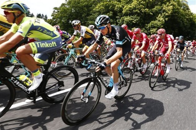 Britain's Chris Froome rides in the pack during the fourth stage of the Tour de France cycling race over 237.5 kilometers (147.3 miles) with start in  Saumur and finish in Limoges, France, Tuesday, July 5, 2016. (AP Photo/Peter Dejong)