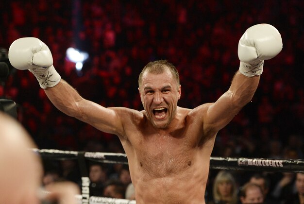 Jan 30, 2016; Montreal, Quebec, Canada;  Sergey Kovalev (white gloves) reacts after defeating Jean Pascal (not pictured) during the world light heavyweight championship boxing match at the Bell Centre. Mandatory Credit: Eric Bolte-USA TODAY Sports