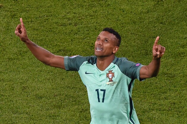Portugal's forward Nani celebrates after scoring a goal during the Euro 2016 semi-final football match between Portugal and Wales at the Parc Olympique Lyonnais stadium in Décines-Charpieu, near Lyon, on July 6, 2016.
 / AFP / JEAN-PHILIPPE KSIAZEK        (Photo credit should read JEAN-PHILIPPE KSIAZEK/AFP/Getty Images)
