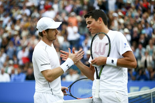 LONDON, ENGLAND - JUNE 19:  Andy Murray of Great Britain (L) celebrates victory in his final match against Milos Raonic of Canada (R) during day seven of the Aegon Championships at the Queens Club on June 19, 2016 in London, England.  (Photo by Jordan Mansfield/Getty Images)