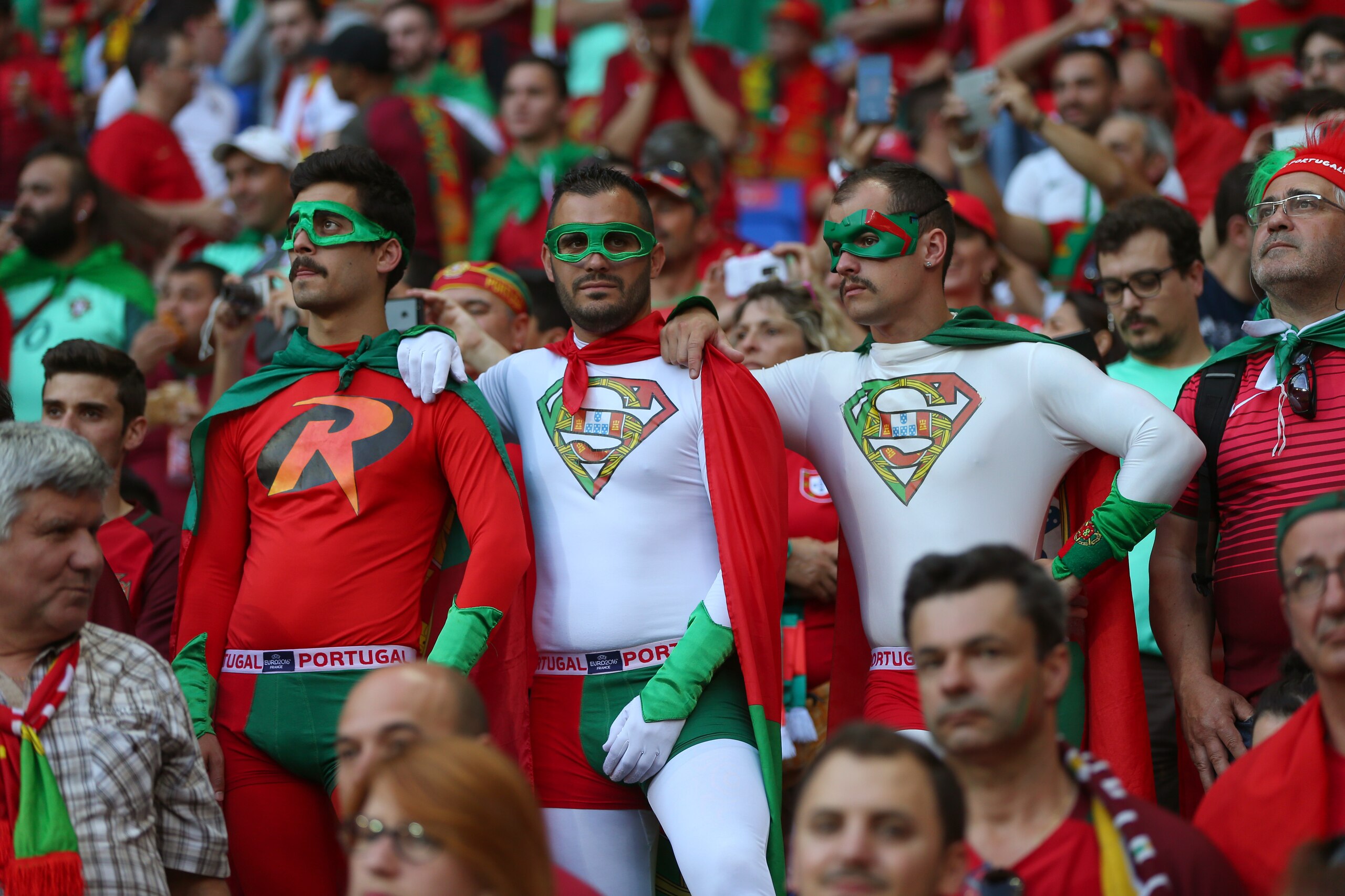 LYON, FRANCE - JULY 06:  Fans of Portugal wearing Superman costumes during the UEFA Euro 2016 semi final match between Portugal and Wales at Stade des Lumieres on July 6, 2016 in Lyon, France. (Photo by Catherine Ivill - AMA/Getty Images)