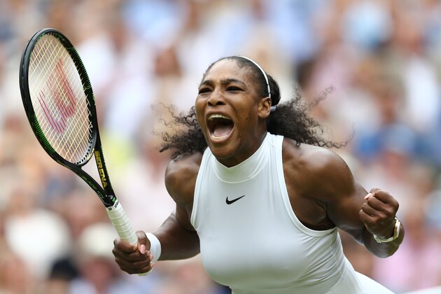 US player Serena Williams celebrates winning the first set against Germany's Angelique Kerber during the women's singles final on the thirteenth day of the 2016 Wimbledon Championships at The All England Lawn Tennis Club in Wimbledon, southwest London, on July 9, 2016. / AFP / JUSTIN TALLIS / RESTRICTED TO EDITORIAL USE        (Photo credit should read JUSTIN TALLIS/AFP/Getty Images)