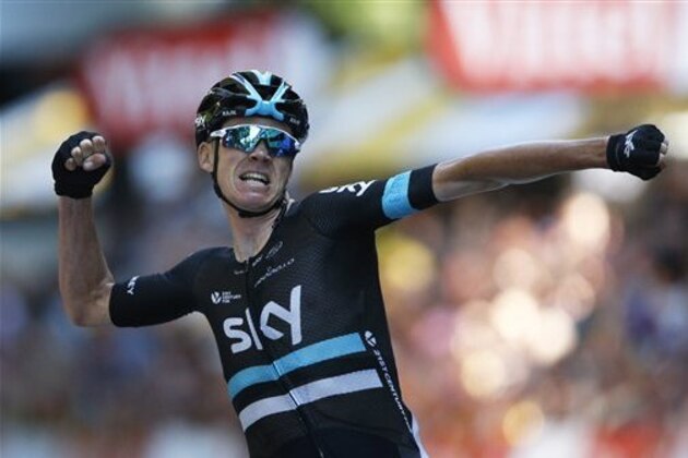 Britain’s Chris Froome celebrates as he crosses the finish line to win the eighth stage of the Tour de France cycling race over 184 kilometers (114.3 miles) with start in Pau and finish in Bagneres-de-Luchon, France, Saturday, July 9, 2016. (AP Photo/Christophe Ena)