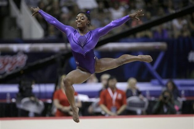 Simone Biles competes on the floor exercise during the women's U.S. Olympic gymnastics trials in San Jose, Calif., Friday, July 8, 2016. (AP Photo/Ben Margot)