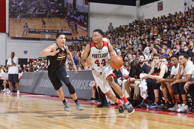 LAS VEGAS, NV - JULY 9:  Luis Montero #44 of the Portland Trail Blazers handles the ball against Devin Booker #1 of the Phoenix Suns during the 2016 NBA Las Vegas Summer League game on July 9, 2016 at the Cox Pavillion in Las Vegas, Nevada. NOTE TO USER: User expressly acknowledges and agrees that, by downloading and or using this photograph, User is consenting to the terms and conditions of the Getty Images License Agreement. Mandatory Copyright Notice: Copyright 2016 NBAE  (Photo by David Dow/NBAE via Getty Images)