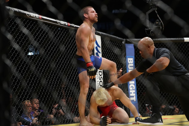 LAS VEGAS, NV - JULY 9: The referee stops between Jim Miller and Takanori Gomi during the UFC 200 event at T-Mobile Arena on July 9, 2016 in Las Vegas, Nevada. (Photo by Rey Del Rio/Getty Images)
