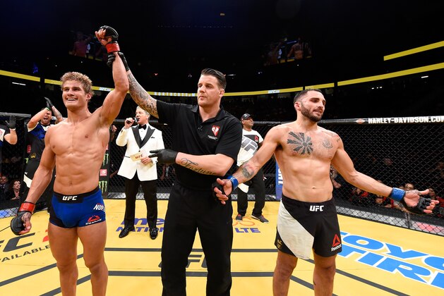 LAS VEGAS, NV - JULY 09: Sage Northcutt (left) reacts to his victory over Enrique Marin of Spain (right) in their lightweight bout during the UFC 200 event on July 9, 2016 at T-Mobile Arena in Las Vegas, Nevada.  (Photo by Josh Hedges/Zuffa LLC/Zuffa LLC via Getty Images)
