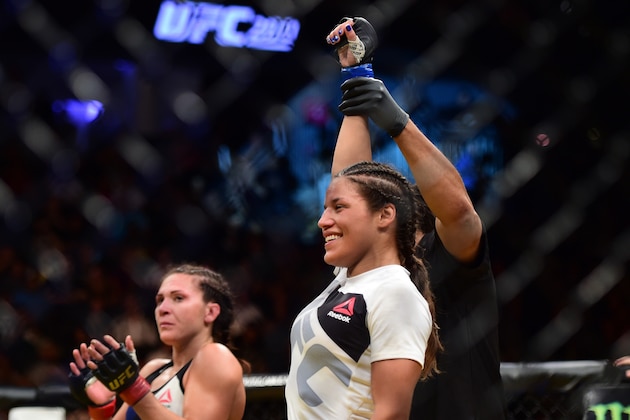 LAS VEGAS, NV - JULY 09:  Julianna Pena (right) reacts to her victory over Cat Zingano (left) in their women's bantamweight bout during the UFC 200 event on July 9, 2016 at T-Mobile Arena in Las Vegas, Nevada.  (Photo by Harry How/Zuffa LLC/Zuffa LLC via Getty Images)