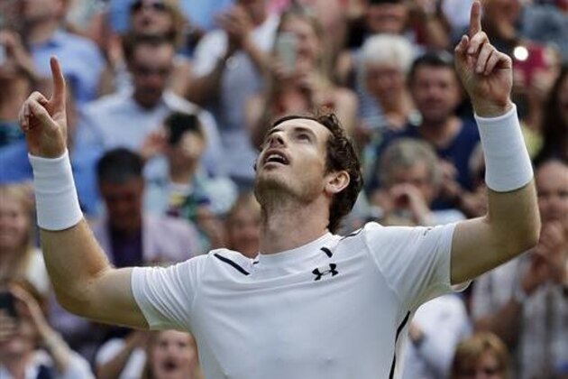 Andy Murray of Britain celebrates after beating Tomas Berdych of the Czech Republic in their men's semifinal singles match on day twelve of the Wimbledon Tennis Championships in London, Friday, July 8, 2016. (AP Photo/Ben Curtis)