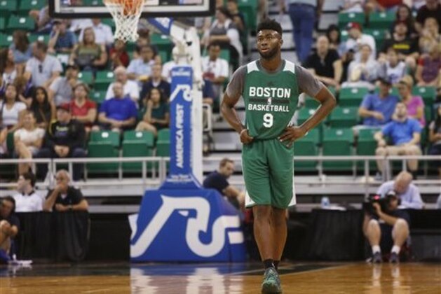 Boston Celtics' Jaylen Brown stands on the court in the second half of an NBA Summer League basketball game against the Philadelphia 76ers on Monday, July 4, 2016, in Salt Lake City. (AP Photo/Kim Raff)