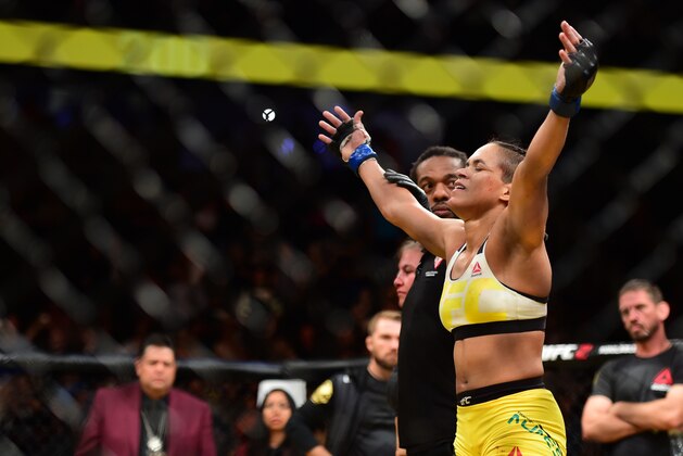 LAS VEGAS, NV - JULY 09:  Amanda Nunes of Brazil reacts after defeating Miesha Tate in their UFC women's bantamweight championship bout during the UFC 200 event on July 9, 2016 at T-Mobile Arena in Las Vegas, Nevada.  (Photo by Harry How/Zuffa LLC/Zuffa LLC via Getty Images)