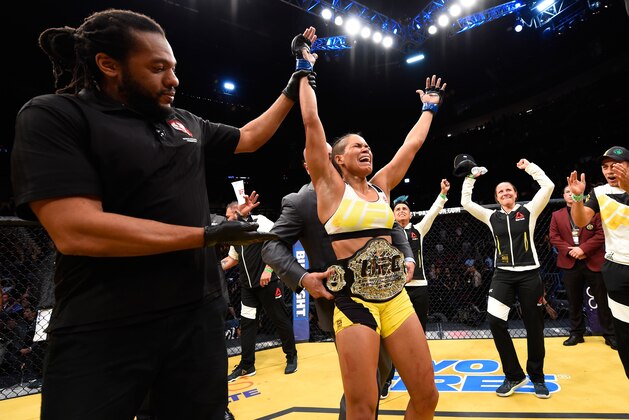 LAS VEGAS, NV - JULY 09:  Amanda Nunes of Brazil reacts to her victory over Miesha Tate in their UFC women's bantamweight championship bout during the UFC 200 event on July 9, 2016 at T-Mobile Arena in Las Vegas, Nevada.  (Photo by Josh Hedges/Zuffa LLC/Zuffa LLC via Getty Images)